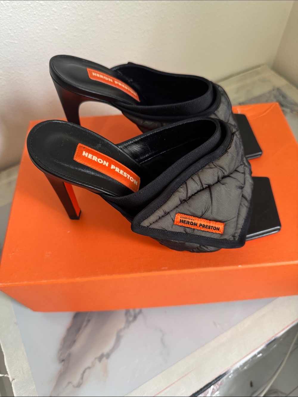 Heron Preston Black Quilted Slide Heels with Orange Branding